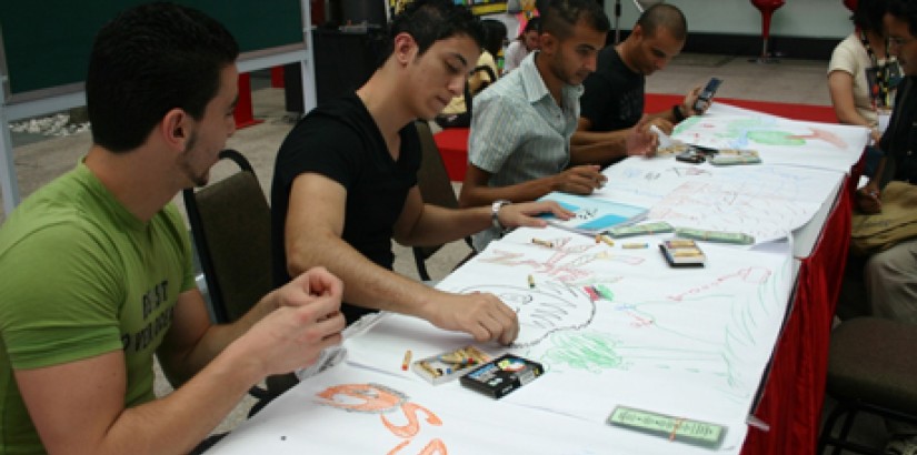 Students relieve stress by drawing pictures about their thoughts and feelings