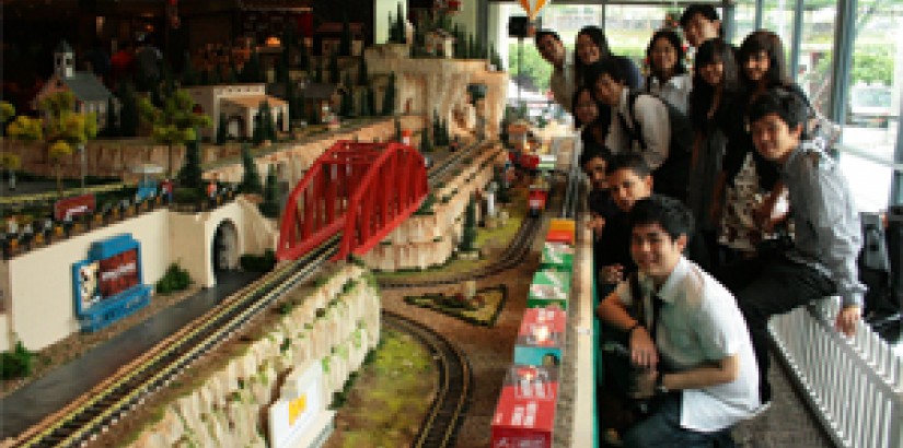 UCSI University’s Architecture students next to the completed landscape model