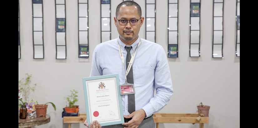 Mohd Fadhil with his Chartered Chemical Engineer certificate from the Institution of Chemical Engineers (IChemE), Engineering Council UK