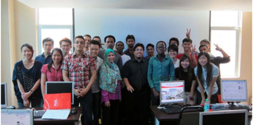  GROUP PORTRAIT: Mr Azizul Othman, Business Development Manager of MOLPay Sdn Bhd (front row, fourth from right), posing with UCSI University’s students and lecturers after the “E-commerce and Online Payment” talk.