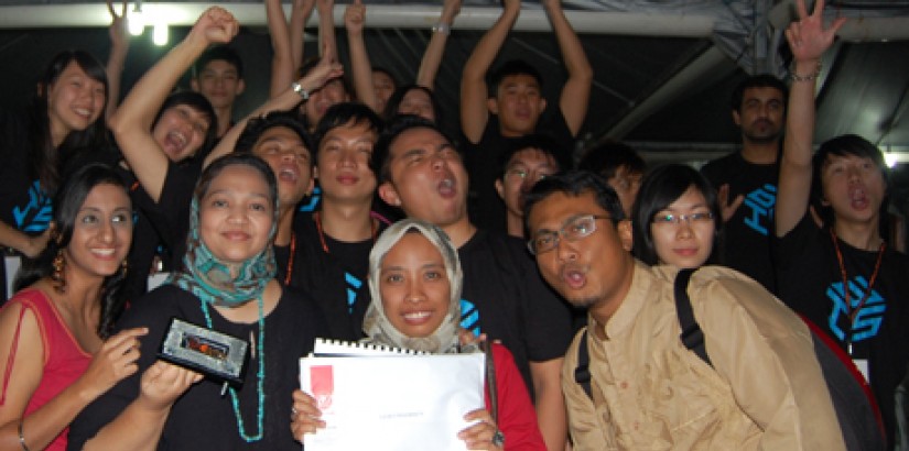 Triumphant students with their lecturers during the announcement of the winners