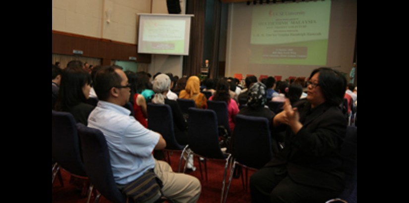 En. Zaine Bujal, a hearing-impaired participant from the Malaysian Federation of the Deaf “listens” to Tan Sri Tengku Razaleigh’s keynote address through a translator