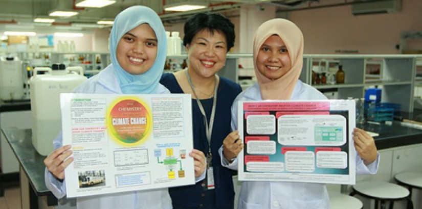 Ms Mabel Tan, head of UCSI University A-Level Academy, stands with students Siti Nur Aelina Abu Bakar (left) and Hafizah Razy after the students were selected to win a free trip to England to study at the University of Bath International Science Summer Sc