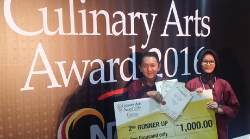 Munirah Aisyah Binti Ibrahim and Chef Loke Hoi Weng at the 9th Nestlé Professional Culinary Arts Awards competition.