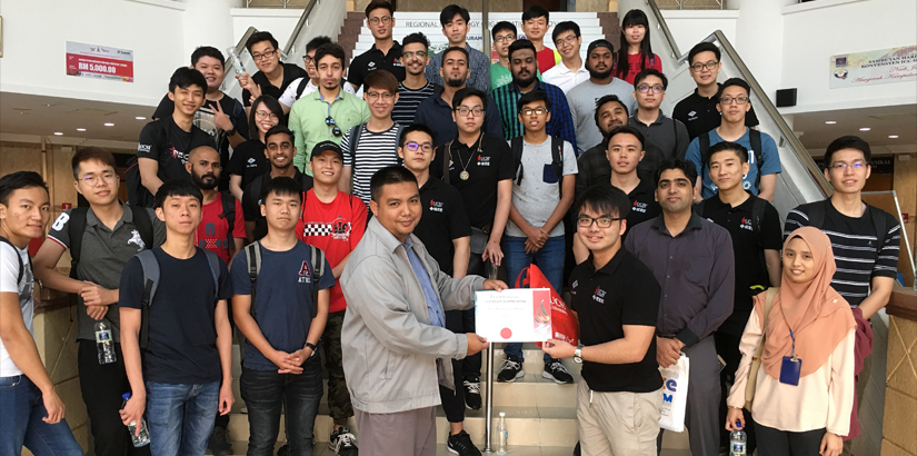 President of UCSI’s IEEE Eta Kappa Nu Mu Alpha Society giving a certificate of appreciation to Fadli Fuad, Senior Executive of NMIM; Group photo of 3rd year Instrument and Measurement course students with their lecturer Shahid Manzoor. 