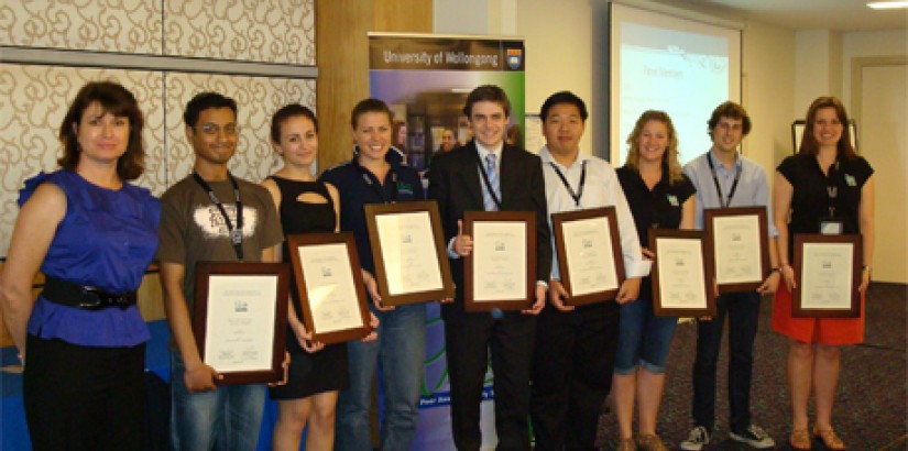 Sim Kwan Choo (fourth from right) stands with other PASS Leader award winners