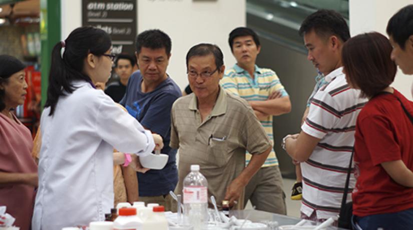  FASCINATING: A UCSI pharmacy student giving the drug compounding demonstration.