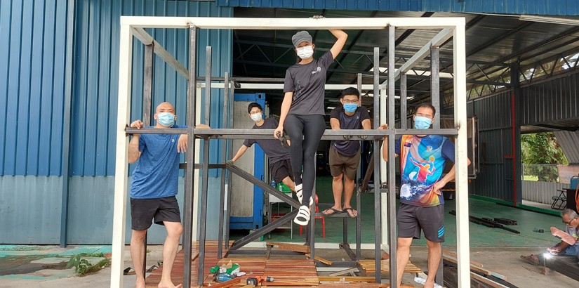 The team assemble the Playscape.