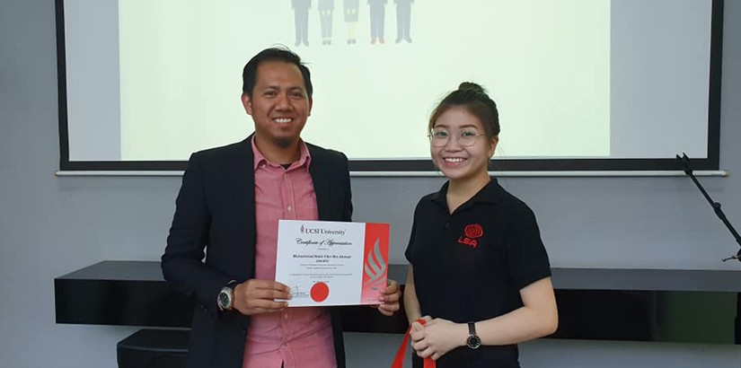 Token of appreciation to Muhammad Nabil Fikri, Assistant Manager of Production Planning from Honda Logistics Malaysia Sdn Bhd.