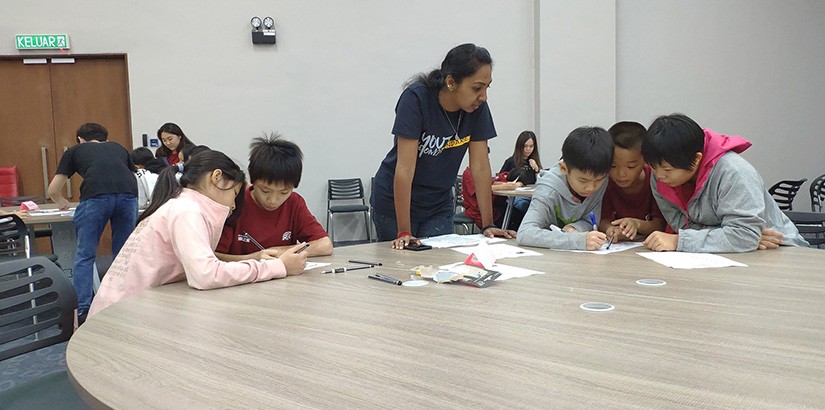 The children engrossed in the activities.