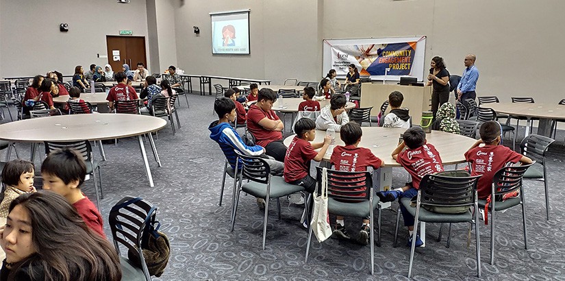 Children listening to the personal hygiene talk.