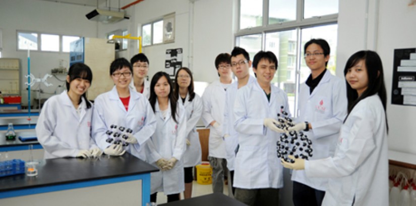 GOOD BONDING: Students posing with ball-and-stick-models at UCSI’s chemistry lab.