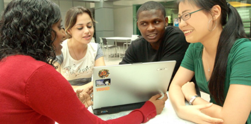 ENGAGED GLOBAL CITIZENS: Psychology students in the midst of discussing a project.