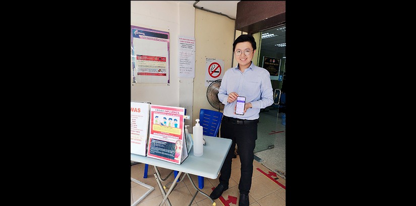  Dr Kev Lim shows the application for Online Appointment system through https://qmed.asia/booking