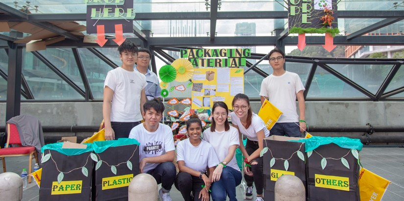 UCSI students collecting recyclable goods at the event.