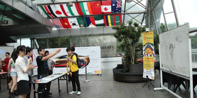  UCSI students participating in the ‘shooting gun’ game on campus grounds during the Shell FuelSave College Competition 2013.