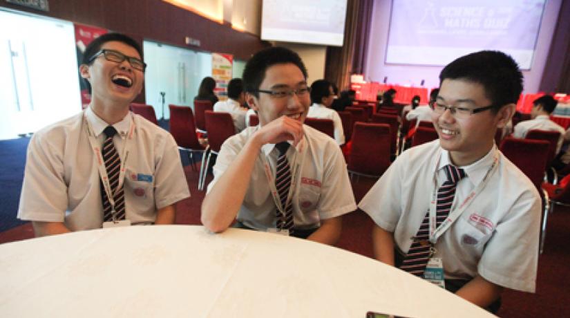 [RELIEVED]: (from left) Ng Jiann Rin, Lim Sze Chen and Ong Teng Keng from SMJK Hua Lian, Perak talk about their preparation process and experience at the event.