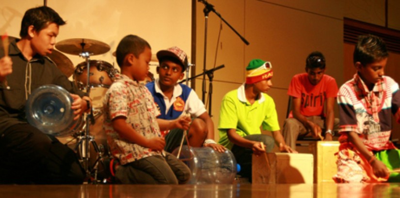 Innovation at work – the children playing music using improvised instruments