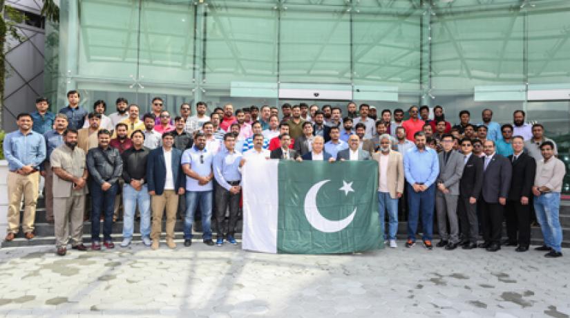 [GROUP PHOTO]: Delegation from Superior University and Group of Colleges, Pakistan sharing a light moment with UCSI University's representatives on campus grounds.