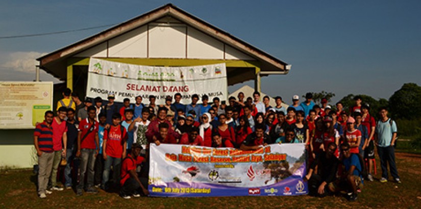  GROUP PORTRAIT: UCSI University's Faculty head of Civil Engineering Ir Asst Prof Ahmad Bin Tamby Kadir (seventh from left, second row) posing for the camera with students at the Raja Musa Forest Reserve during the tree planting campaign.