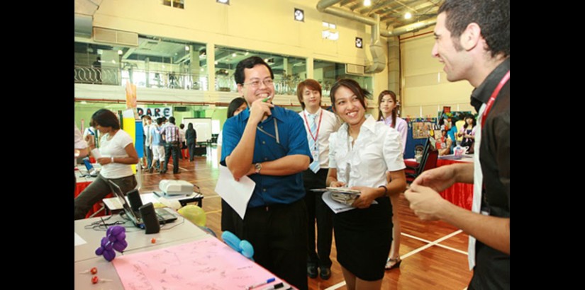 A UCSI University first year student sharing a light moment with the judges during the 'Universit​y Life' final showcase