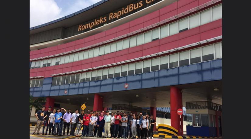 The student group in front of the Cheras Selatan Rapid Bus Complex