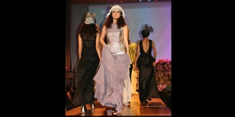 IN STYLE:Models wearing fashion student Teh Boon Jean's architecture themed designs at the runway during the Graduation Show cum Art Exhibition