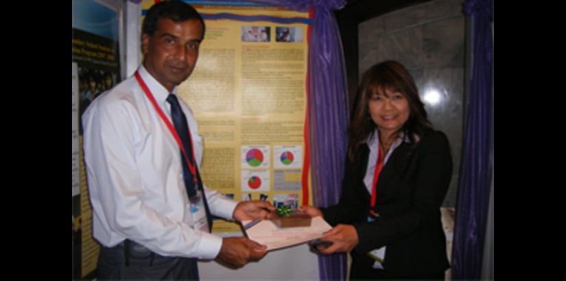 Dr. Gul receiving his token of appreciation from one of the organisers of the 1st Annual International Graduate Conference on Social Sciences and Humanities in Bangkok, Thailand where he first presented his research paper on Commercial Sex Workers in Paki