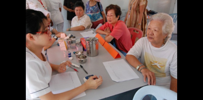 UCSI University nursing students providing health couseling to residents of Taman Midah