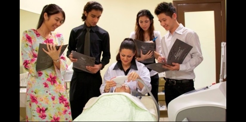 HANDS-ON EXPERIENCE: A doctor from the School of Anti-ageing, Aesthetics & Regenerative Medicine conducting a facial treatment demonstration on a patient.