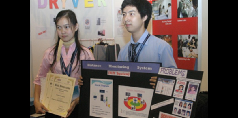 The Engineering students with their invention, the Distance Monitoring System (DMS) at a recent competition