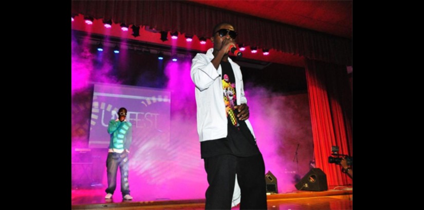 A UCSI University student raps out his song during the concert