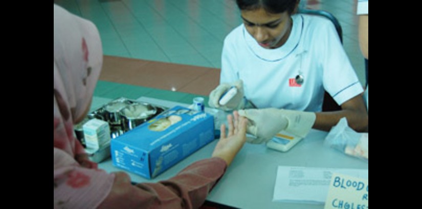 Nursing Student Conducting Blood Test