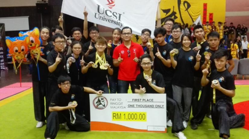  VICTORY: (in red) Amar Ridzuan, advisor for UCSI University Wushu Club in a group photo along with the team members.