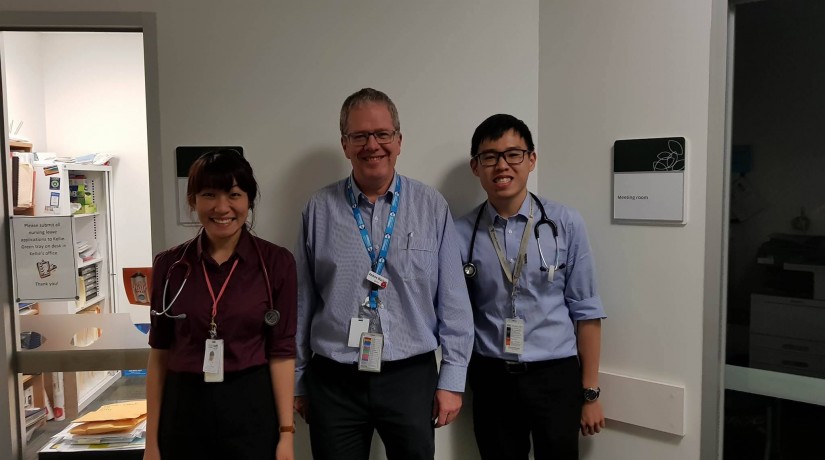 Lee Jun Keong and Tay Ru-Fang with the Head of Department of Emergency Medicine, Dr. Andrew Maclean