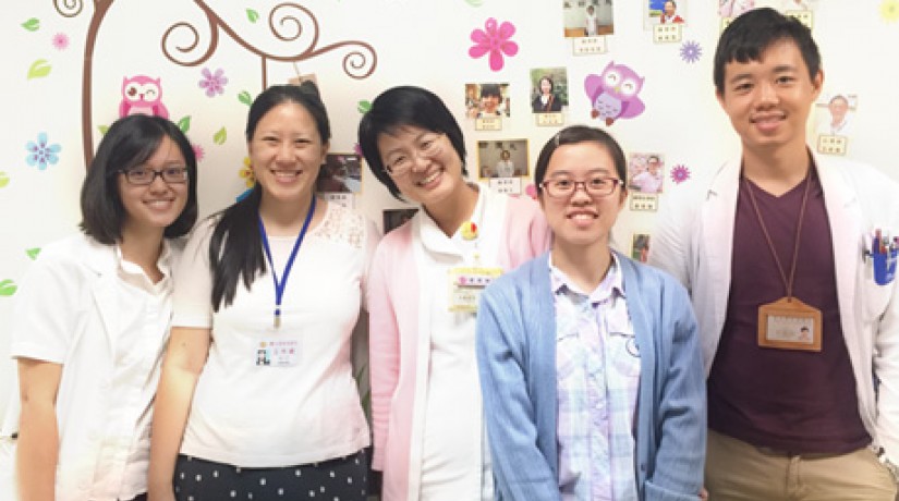 Yan pictured with the hospice care team.