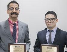 Dr Ahamed Khan and Dr Lim with their respective awards from IEEE.