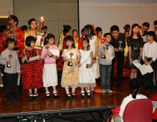 Students show off their awards during the ANCZA Music Festival 2011, hosted by UCSI University.