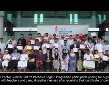 Summer 2012's Intensive English Programme participants posing for a group photo with teachers and camp discipline masters after receiving their certificate of completion.