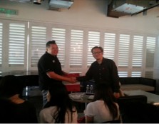 TOKEN OF APPRECIATION: Mr. Quah presenting the token of appreciation to Mr. Benjamin Yong (left), owner of the BIG group