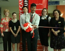 Vice President of Student Affairs, Associate Professor Dr. Lachman Tarachand launches the Study Canada Fair with a ribbon-cutting ceremony while representatives from participating Canadian universities look on