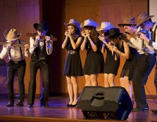  AS GOOD AS VEGAS: Proving that a harmonica concert can be light-hearted and fun, the student performers dressed up while performing to raise funds for their participation in the World Harmonica Festival, which has been described as the 'Olympics' of harm