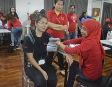  Participants having their free health screening.