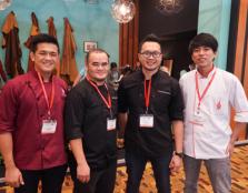 ALL SMILES: (from left) Tomy Wijaya; Joseph Martin Pudun (lecturer), Christopher Wan Sageng, Head of the Culinary Arts programme; and Edison Teo Kai Seng in a group photo at the Food & Hotel Malaysia 2015.