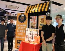 [NEW AND IMPROVED]: Year 2 student Lucas Tan (second from left) and his team members chose to recreate A&W’s packaging concept with a modern look that still paid homage to the brand’s signature root beer float.
