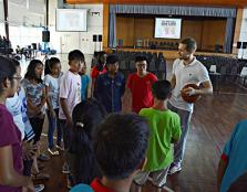 FUN TIME: Student Affairs & Alumni division head (Sports and Fitness Department) Vitalii Goncharenko engaging children in a basketball game.
