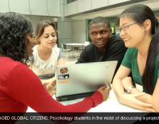 ENGAGED GLOBAL CITIZENS: Psychology students in the midst of discussing a project.