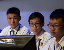  FOCUSED: Participants from Kuen Cheng High School reading the questions on screen.