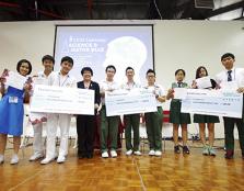  TEAM WINNERS: The champion, first runner-up, and second runner-up teams from SMJK Katholik PJ (centre), Chong Hwa Independent High School (left) and Sayfol International School (right) with Asst Prof Dr Mabel Tan, Director, Centre for Pre-U Studies.