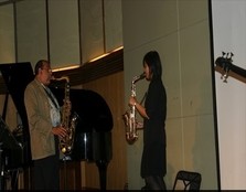 Two-time Grammy Award winner and one of the most versatile and prolific saxophone players in music,Ernie Watts,sharing a few pointers with a UCSI University student.